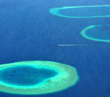 Фото Soneva Fushi (, Мальдивские острова) 1